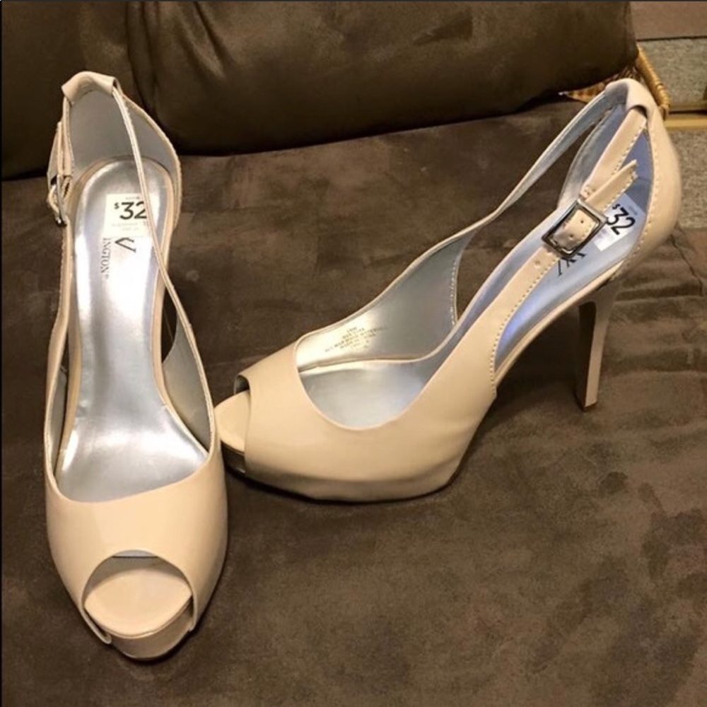 Cream colored peep toe pumps